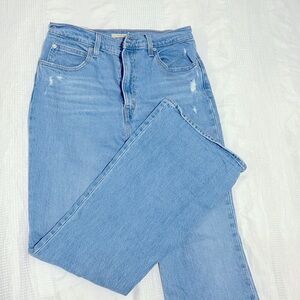 Levis. Size 29. Color light blue.
